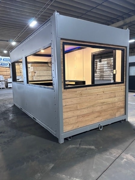 Custom shipping container modified for job site use